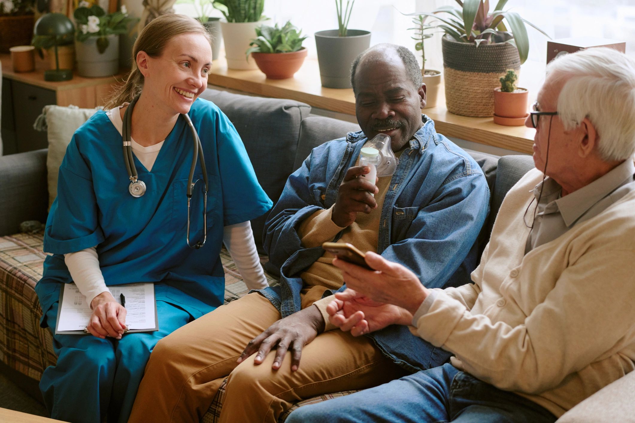 mobile healthcare team visiting patient at home